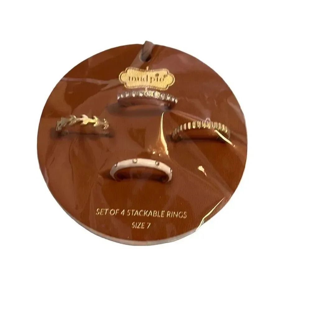 MudPie set of four stackable rings. Costume jewelry. New in package.